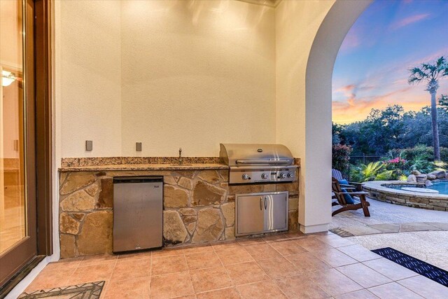 3312 Pearce Rd, Austin, TX 78730 - patio terrace at dusk with a patio and a sink