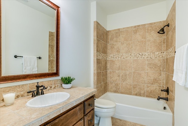 full bath with toilet, vanity, and shower / tub combination