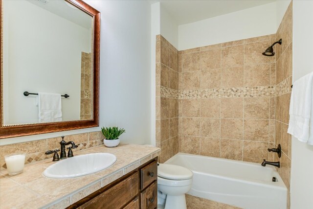 3312 Pearce Rd, Austin, TX 78730 - bathroom with vanity, toilet, and bathtub / shower combination