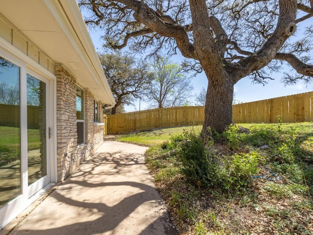 1403 E Applegate Dr, Austin, TX 78753 - fenced backyard with a patio