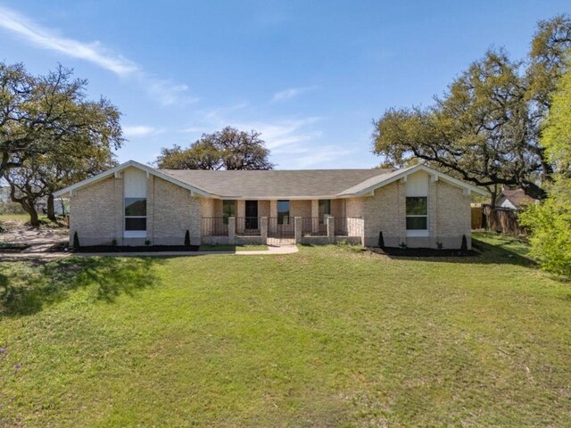 1403 E Applegate Dr, Austin, TX 78753 - mid-century modern home with brick siding