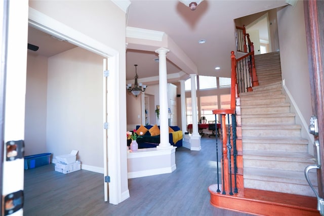 11608 Spicewood Pkwy Unit 38, Austin, TX 78750 - stairway featuring ornate columns, wood finished floors, recessed lighting, and a chandelier
