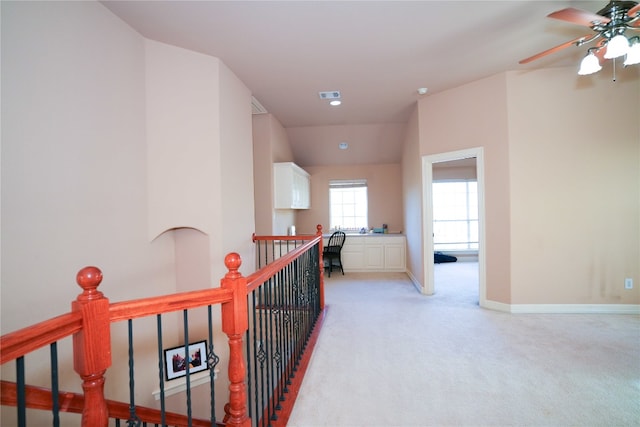 11608 Spicewood Pkwy Unit 38, Austin, TX 78750 - hallway featuring an upstairs landing and light carpet