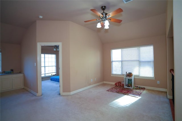 11608 Spicewood Pkwy Unit 38, Austin, TX 78750 - living area with vaulted ceiling, light carpet, and ceiling fan