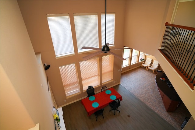 11608 Spicewood Pkwy Unit 38, Austin, TX 78750 - playroom with wood finished floors, a towering ceiling, and a ceiling fan