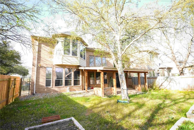 11608 Spicewood Pkwy Unit 38, Austin, TX 78750 - rear view of property with a fenced backyard, a patio area, and a gate