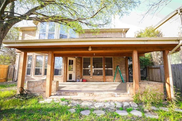 11608 Spicewood Pkwy Unit 38, Austin, TX 78750 - rear view of property with brick siding