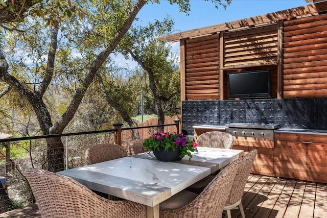 12413 Fairfax Ridge Pl, Austin, TX 78738 - wooden deck with outdoor dining area and area for grilling