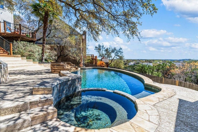 12413 Fairfax Ridge Pl, Austin, TX 78738 - view of swimming pool featuring stairway, a pool with connected hot tub, a wooden deck, and a patio