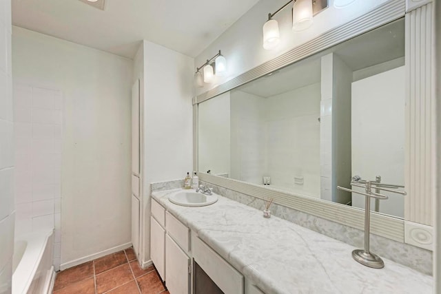 8610 Croydon Loop, Austin, TX 78748 - full bathroom featuring vanity, baseboards, and tile patterned flooring