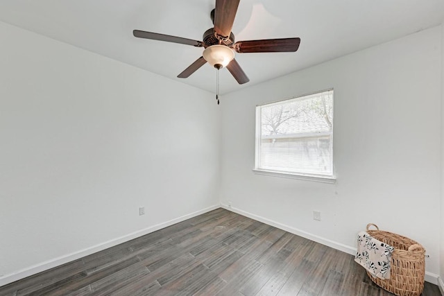 8610 Croydon Loop, Austin, TX 78748 - unfurnished room featuring baseboards, a ceiling fan, and dark wood-style flooring
