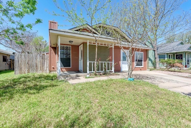 8610 Croydon Loop, Austin, TX 78748 - view of front of home with covered porch, a chimney, and concrete driveway