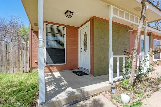 8610 Croydon Loop, Austin, TX 78748 - property entrance featuring brick siding and a porch