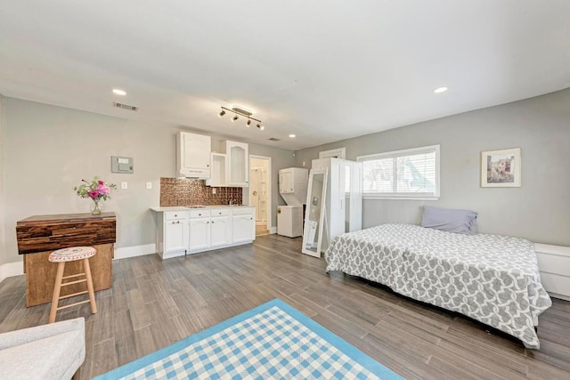8610 Croydon Loop, Austin, TX 78748 - bedroom with recessed lighting, visible vents, and wood finished floors