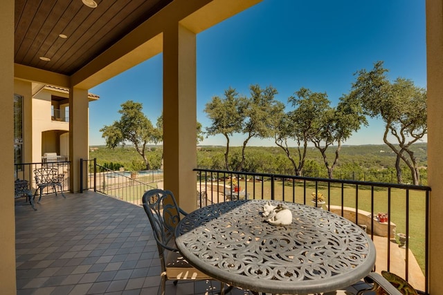 balcony with outdoor dining area