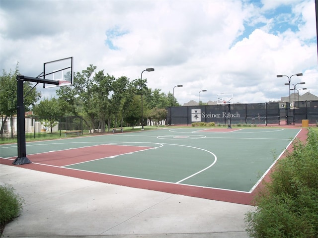 view of sport court with fence and community basketball court