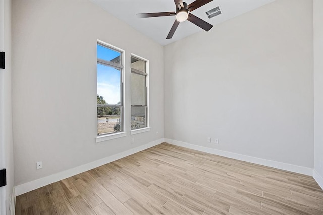 390 Crosswater Ln, Dripping Springs, TX 78620 - spare room with light wood-style flooring, a ceiling fan, and baseboards