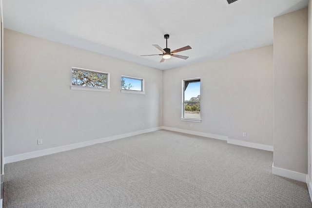 390 Crosswater Ln, Dripping Springs, TX 78620 - spare room with ceiling fan, baseboards, and carpet flooring