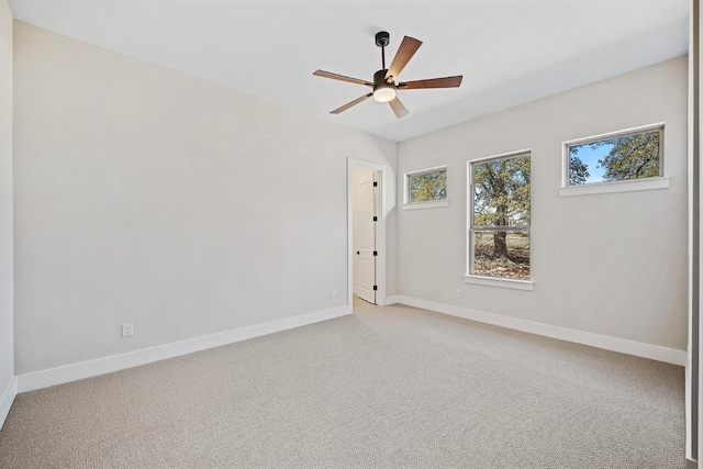 390 Crosswater Ln, Dripping Springs, TX 78620 - empty room featuring ceiling fan, light colored carpet, and baseboards