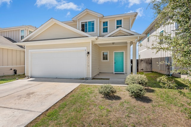 5319 Marsh Ln, Buda, TX 78610 - view of front facade featuring driveway, a garage, and fence