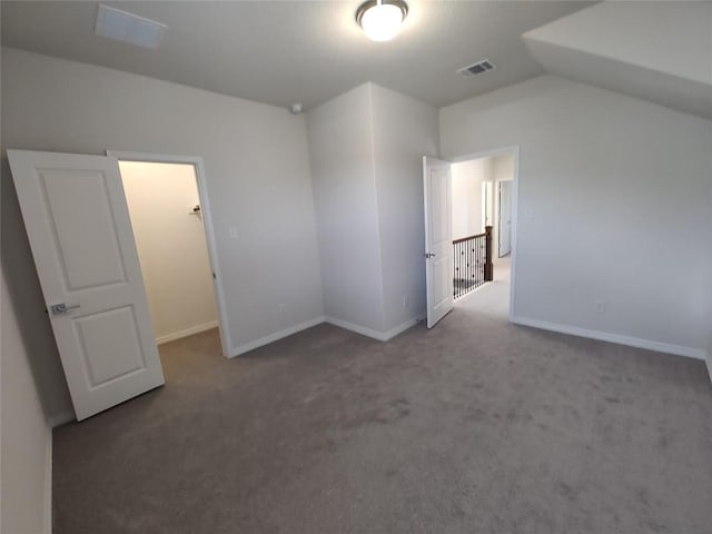 4336 Trey Edsel Dr, Pflugerville, TX 78660 - unfurnished bedroom featuring carpet, vaulted ceiling, and a spacious closet