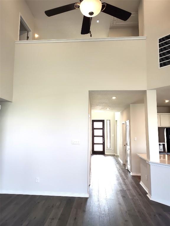 4336 Trey Edsel Dr, Pflugerville, TX 78660 - unfurnished living room with ceiling fan and dark wood finished floors