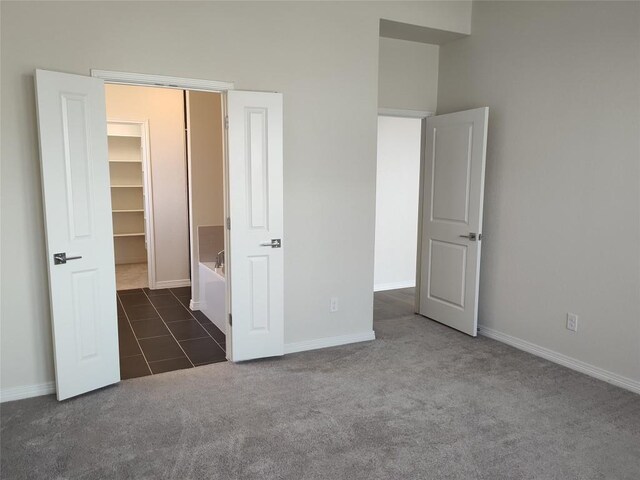 4336 Trey Edsel Dr, Pflugerville, TX 78660 - unfurnished bedroom with carpet flooring and a walk in closet