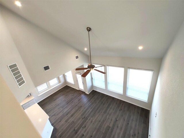 4336 Trey Edsel Dr, Pflugerville, TX 78660 - unfurnished living room featuring dark wood finished floors, ceiling fan, recessed lighting, and high vaulted ceiling