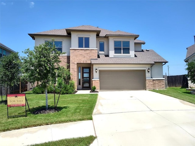 4336 Trey Edsel Dr, Pflugerville, TX 78660 - prairie-style home with stucco siding, brick siding, concrete driveway, an attached garage, and roof with shingles