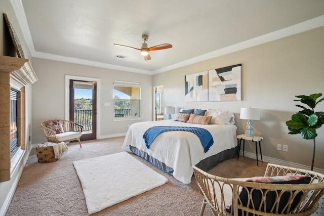 23617 Indian Divide Cv, Spicewood, TX 78669 - carpeted bedroom with access to exterior, baseboards, ornamental molding, and a ceiling fan
