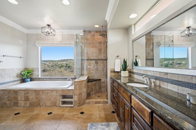 23617 Indian Divide Cv, Spicewood, TX 78669 - full bath with vanity, a garden tub, tiled shower, recessed lighting, and a chandelier