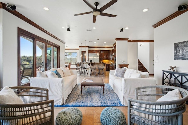 23617 Indian Divide Cv, Spicewood, TX 78669 - living room with ornamental molding, ceiling fan, recessed lighting, and stairway