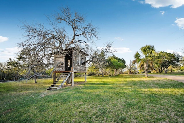 23617 Indian Divide Cv, Spicewood, TX 78669 - view of green lawn with stairs