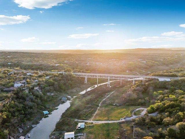 23617 Indian Divide Cv, Spicewood, TX 78669 - aerial overview of property's location with a nearby body of water and a notable bridge