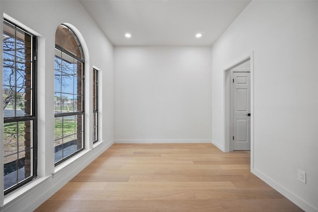 11107 Amblewood Way, Austin, TX 78753 - unfurnished room featuring light wood finished floors, recessed lighting, and baseboards
