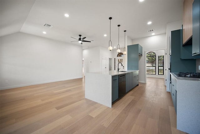 11107 Amblewood Way, Austin, TX 78753 - kitchen with ceiling fan, black gas cooktop, light countertops, dishwashing machine, and light wood-style floors