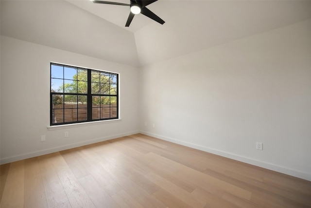 11107 Amblewood Way, Austin, TX 78753 - spare room with light wood-type flooring, ceiling fan, baseboards, and vaulted ceiling