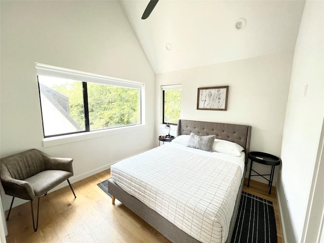 1100 Brass St Unit 2, Austin, TX 78702 - bedroom featuring lofted ceiling, light wood-style flooring, ceiling fan, and baseboards