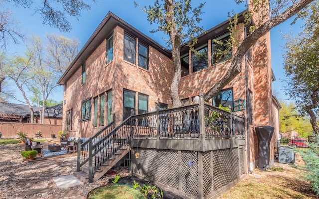 3809 Bent Brook Dr, Round Rock, TX 78664 - rear view of property with a deck, stairway, a patio area, and an outdoor living space