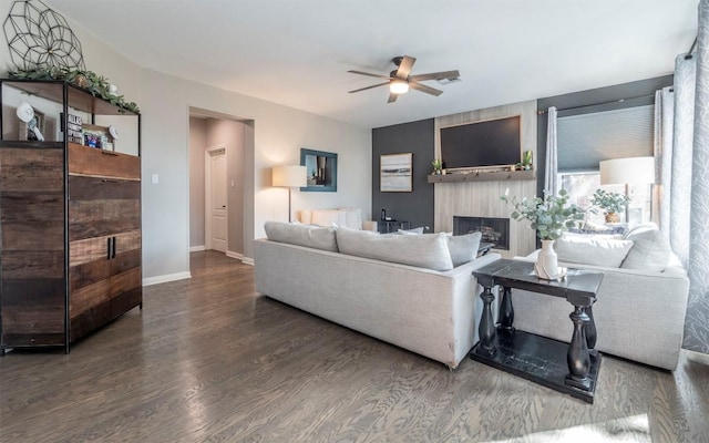 3809 Bent Brook Dr, Round Rock, TX 78664 - living area with a ceiling fan, wood finished floors, and a large fireplace