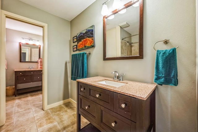 11214 Stormy Ridge Rd, Austin, TX 78739 - full bathroom with vanity, tile patterned floors, and a shower