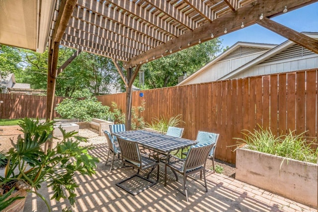11214 Stormy Ridge Rd, Austin, TX 78739 - fenced backyard featuring a patio area, outdoor dining space, and a pergola