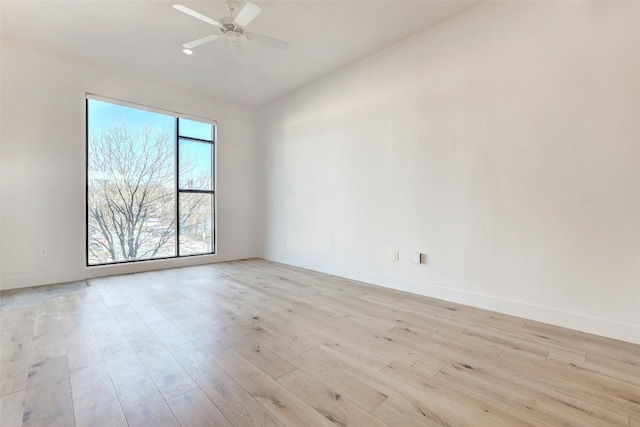 2525 S Lamar Blvd Unit 204, Austin, TX 78704 - spare room featuring light wood-style floors, a ceiling fan, and lofted ceiling