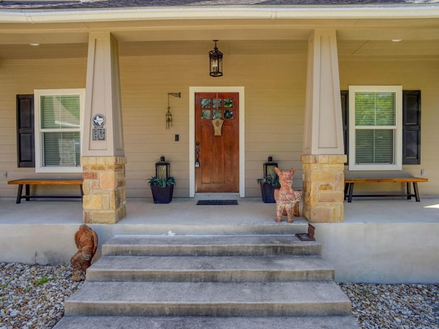 entrance to property with a porch