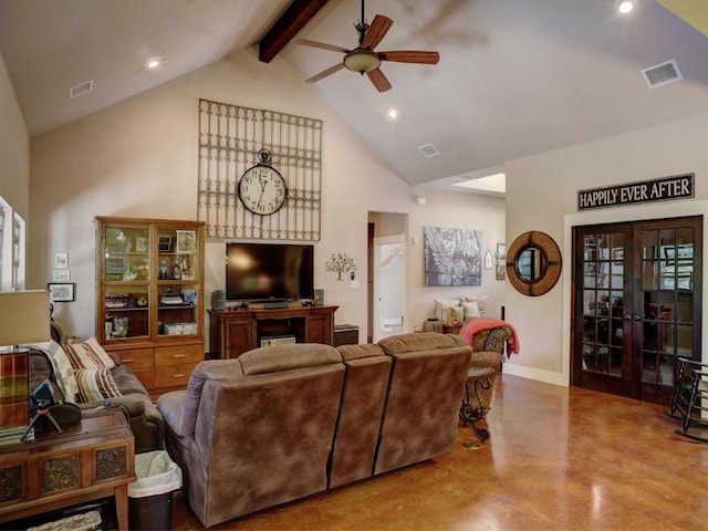 living room with finished concrete flooring, high vaulted ceiling, a ceiling fan, and visible vents