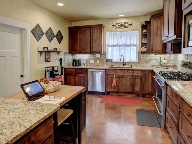 kitchen with open shelves, light stone counters, a sink, stainless steel appliances, and decorative backsplash