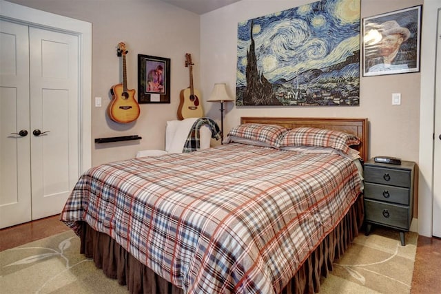 bedroom with a closet and carpet flooring