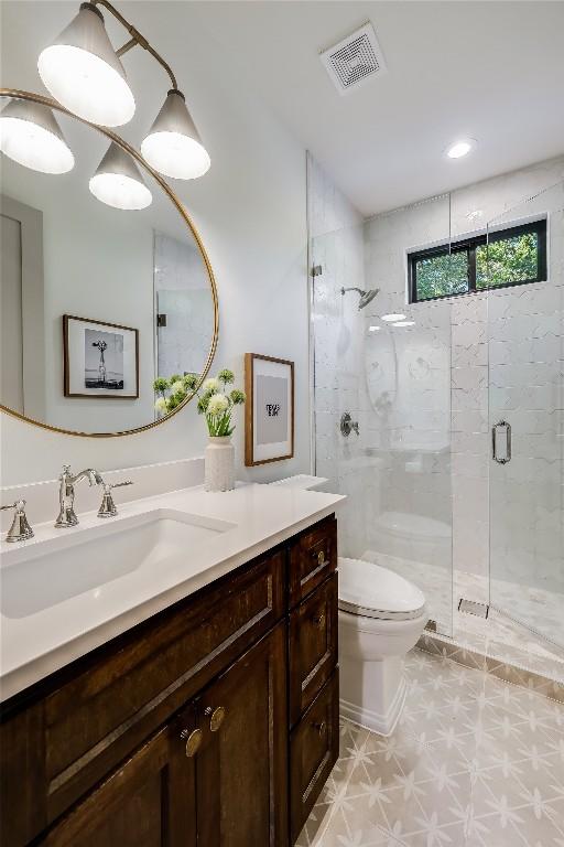 7601 Bar K Ranch Rd, Lago Vista, TX 78645 - bathroom featuring vanity and a shower stall