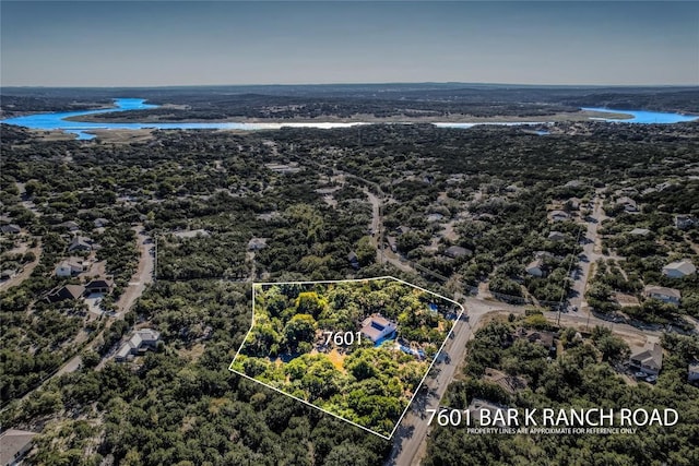 7601 Bar K Ranch Rd, Lago Vista, TX 78645 - aerial overview of property's location with a nearby body of water and property boundaries highlighted