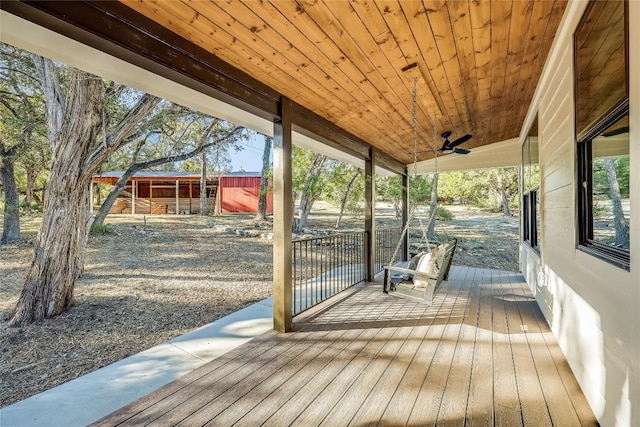 7601 Bar K Ranch Rd, Lago Vista, TX 78645 - wooden terrace featuring ceiling fan and a storage shed
